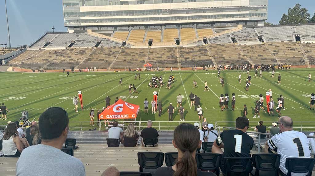 Purdue watching players practice during Fan Day
